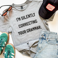 Graphic t-shirt that says 'I’m Silently Correcting Your Grammar' – funny editor and teacher shirt