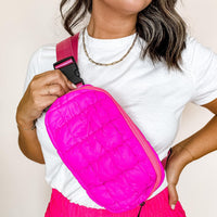 hot pink quilted crossbody belt bag with gold zipper