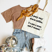 Brown t-shirt, denim shorts, gold scarf, white tote bag with text, disco ball on a white background