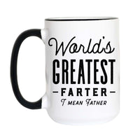 A white ceramic coffee mug with a black handle and black rim, featuring the humorous text 'World's Greatest Farter I Mean Father' printed in black on the front.