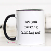 Mug with text 'are you fucking kidding me?' on a white background