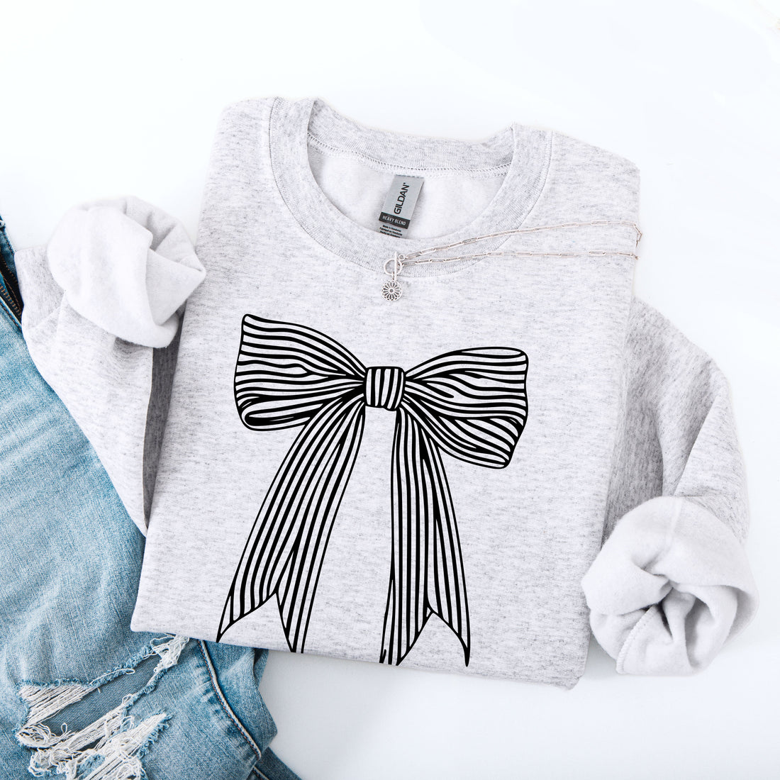 Heather ash sweatshirt with black striped coquette bow graphic – cozy trendy pullover