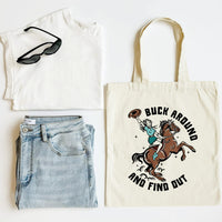 White tank top, blue jeans, sunglasses, and a tote bag with a horse and rider graphic on a white background.