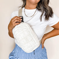 Cream quilted fanny pack with adjustable strap and zipper