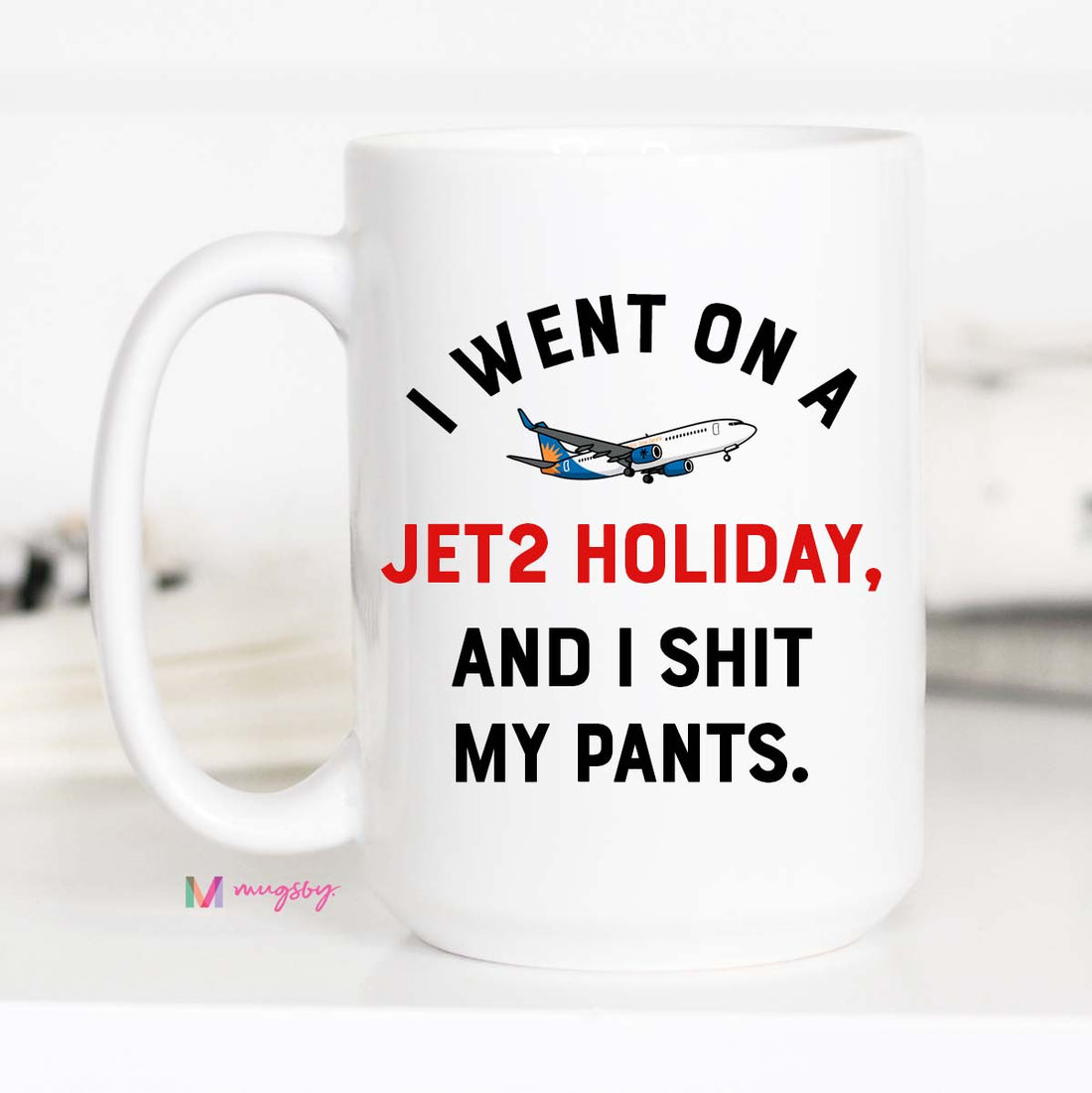 Funny ceramic mug with UK travel meme – Jet2 holiday joke saying I shit my pants, microwave + dishwasher safe