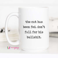 White mug with humorous text on a white background