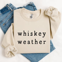 Beige sweatshirt with 'whiskey weather' text on a white background