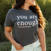 Graphic t-shirt that says 'You are enough. We don’t need more of you' – sarcastic funny tee for introverts