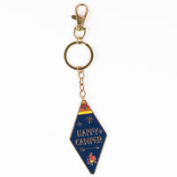Camp Collection Soft Enamel Keychains - Happy Camper, Take a Hike, Adventure Awaits, and Wanderslut designs.