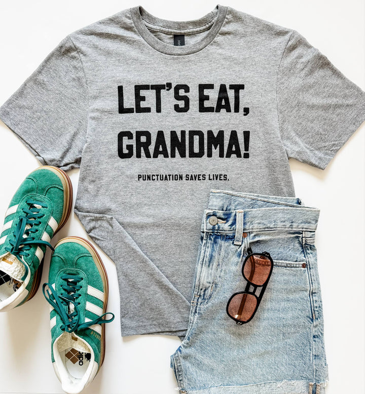 Graphic tee that says 'Let’s Eat Grandma' – funny grammar and punctuation humor shirt