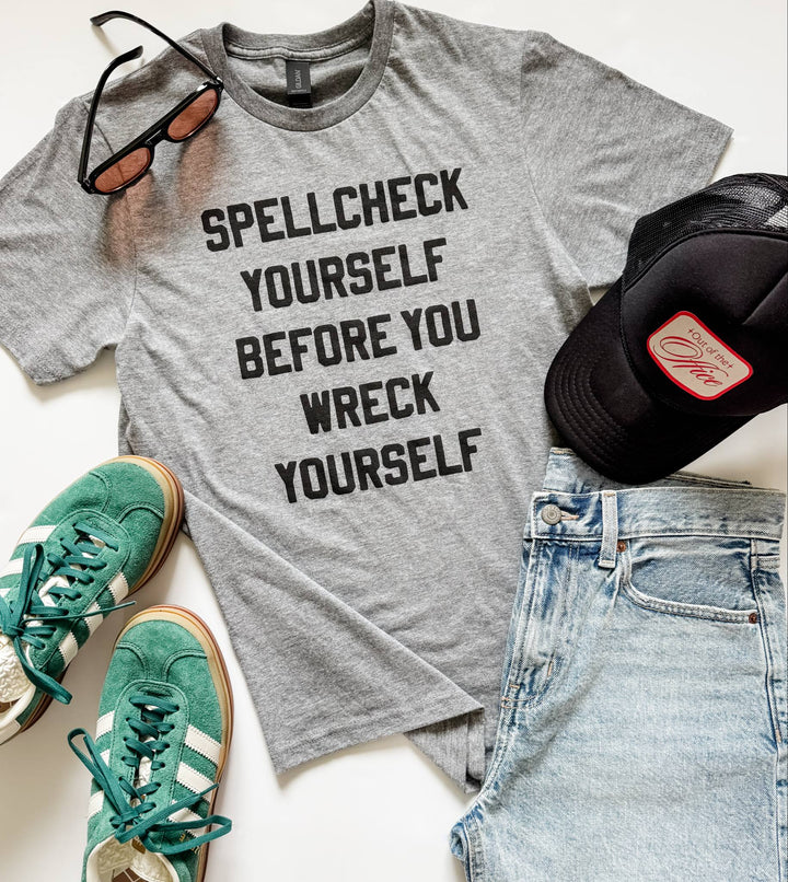 Graphic tee that says 'Spellcheck Yourself Before You Wreck Yourself' – funny grammar shirt