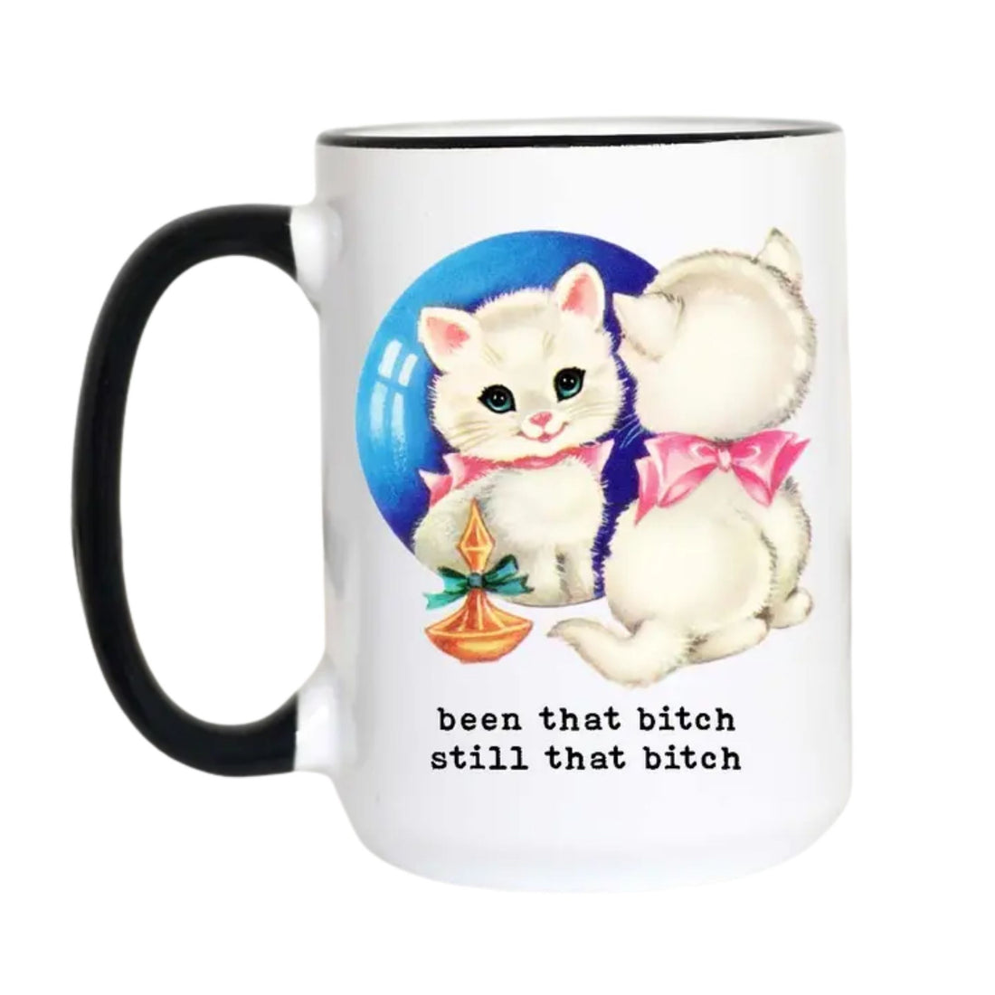 A white ceramic mug with a black handle and black rim, featuring a graphic of two white kittens with pink bows, a blue circular background, and the text &