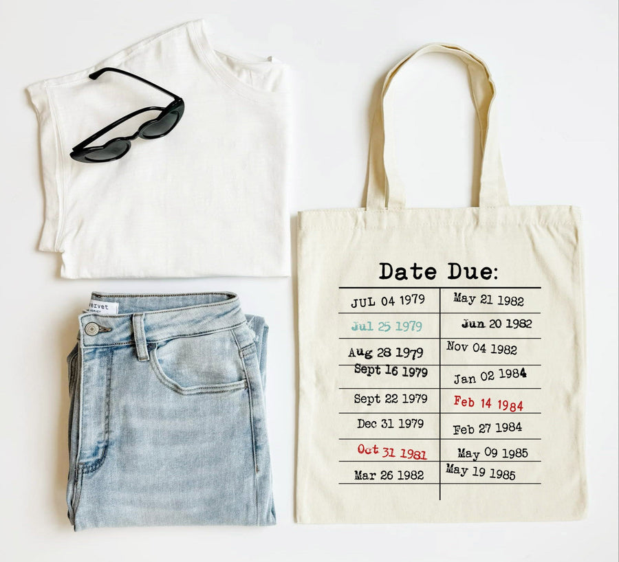 White tank top, blue jeans, sunglasses, and a tote bag with 'Date Due' text on a white background