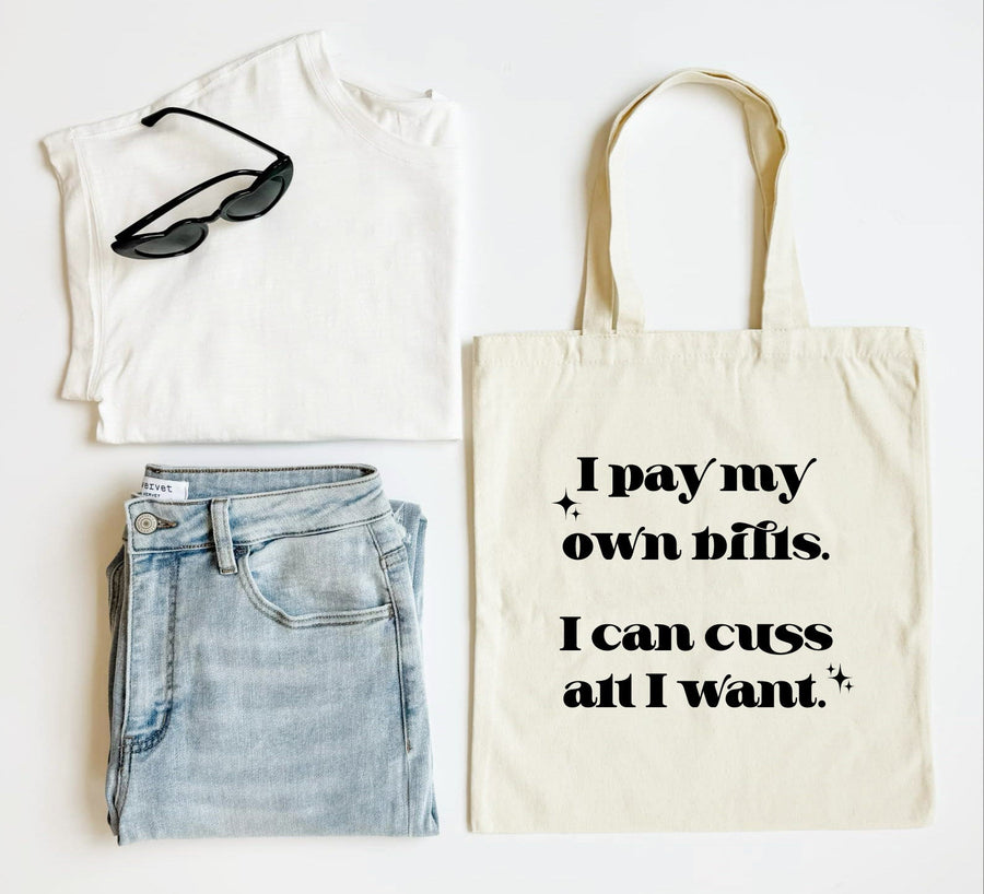 White tank top, blue jeans, black sunglasses, and a tote bag with text on a white background