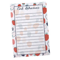 A small notepad with a strawberry and fruit border pattern, featuring a lined writing area labeled 'Evil Schemes' at the top.