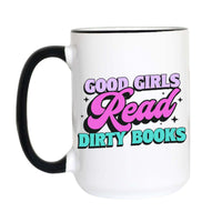 A white ceramic mug with a black handle and black rim, featuring the text 'GOOD GIRLS Read DIRTY BOOKS' in pink, purple, and teal lettering on the front.