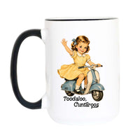 A white ceramic mug with a black handle and black rim, featuring a retro illustration of a young girl in a yellow dress riding a blue scooter and the text 'Toodaloo, Cuntários'.