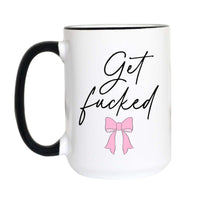 Funny coquette coffee mug featuring the phrase "Get Fucked" in elegant script with a pink bow.
