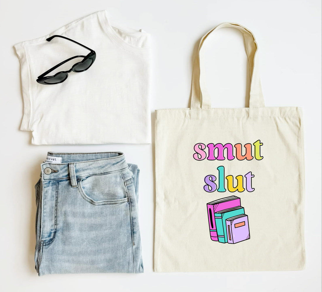 White tank top, blue jeans, black sunglasses, and a tote bag with colorful text and book illustrations on a white background.