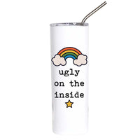 A white insulated tumbler with a clear lid and metal straw, featuring a cartoon rainbow, clouds, the text 'ugly on the inside' in black, and a small yellow star on a plain white background.