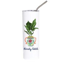 A tall white insulated tumbler with a clear lid and metal straw, featuring a printed illustration of a potted green plant in a decorative multicolor pot and the phrase 'thirsty bitch' in blue script below.