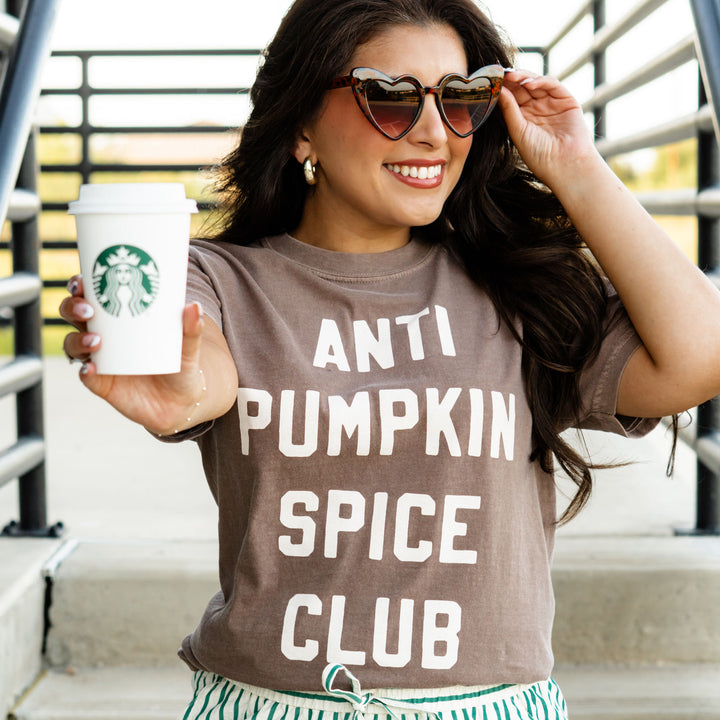 Graphic t-shirt that says 'Anti Pumpkin Spice Club' – funny fall shirt for coffee lovers