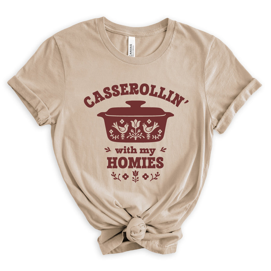 Graphic t-shirt that says 'Thanksgiving Casserole Club' – funny fall holiday tee
