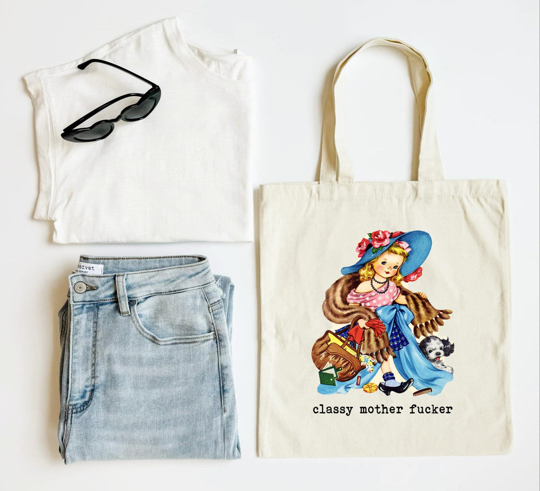 White tank top, blue jeans, sunglasses, and a tote bag with a graphic design on a white background