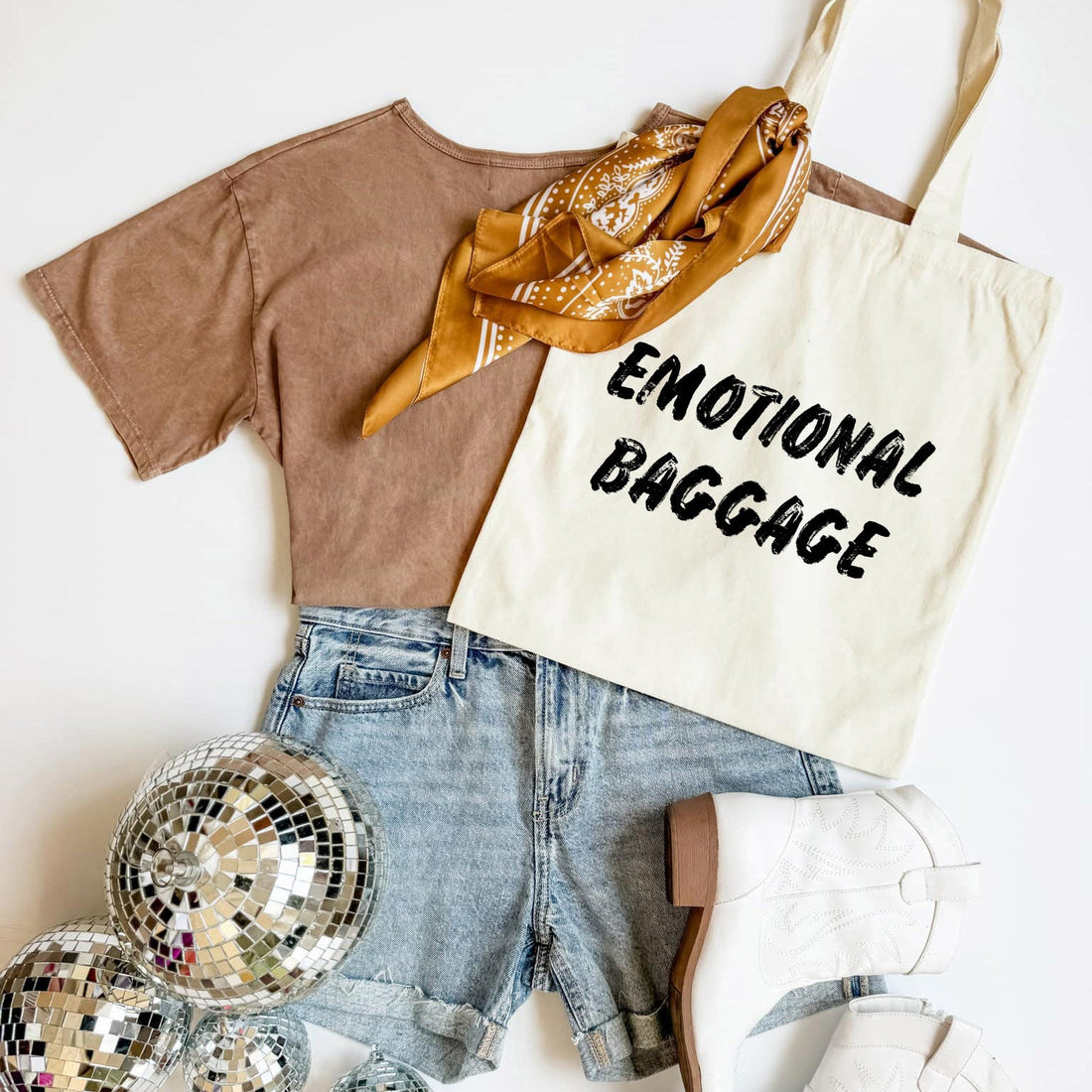 Brown t-shirt, denim shorts, gold scarf, &