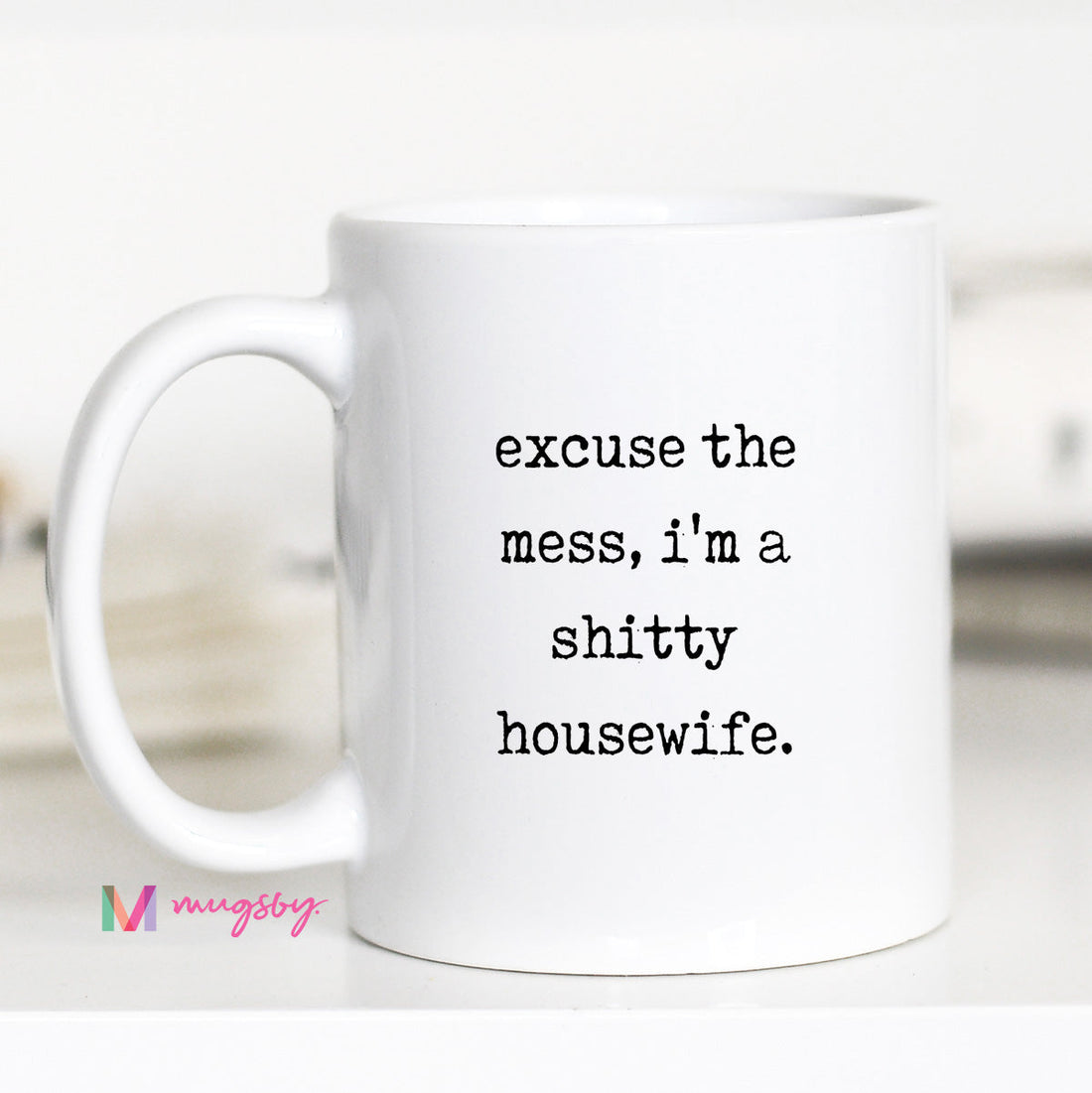 White mug with text &