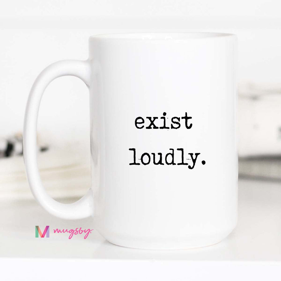 White mug with 'exist loudly.' text on a white background