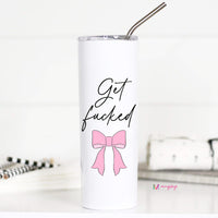 White tumbler with black text and pink bow design on a white background