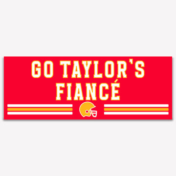 Red banner with 'GO TAYLOR'S FIANCE' text and football helmet graphic on a white background