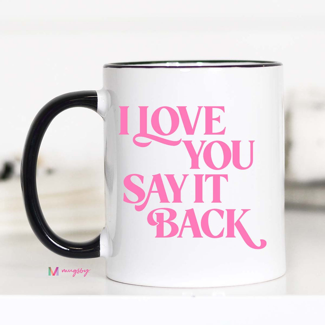 White mug with pink text &