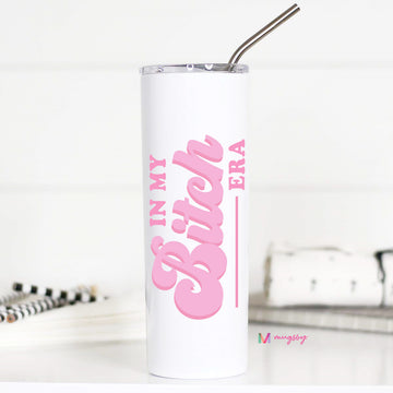 White tumbler with pink text 'IN MY BITCH ERA' on a white background