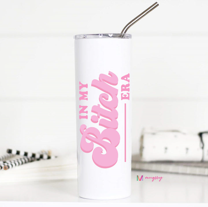 White tumbler with pink text 'IN MY BITCH ERA' on a white background