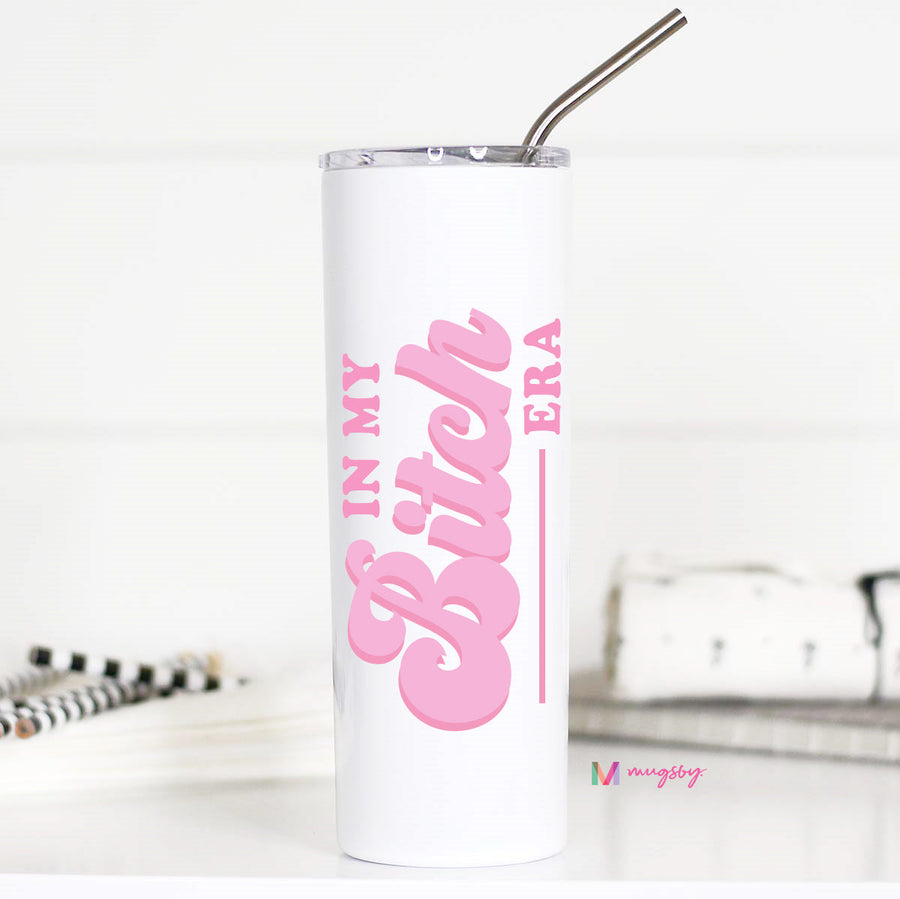 White tumbler with pink text 'IN MY BITCH ERA' on a white background