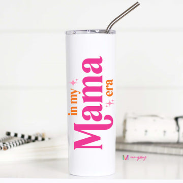 White tumbler with colorful text 'in my Mama era' on a white background