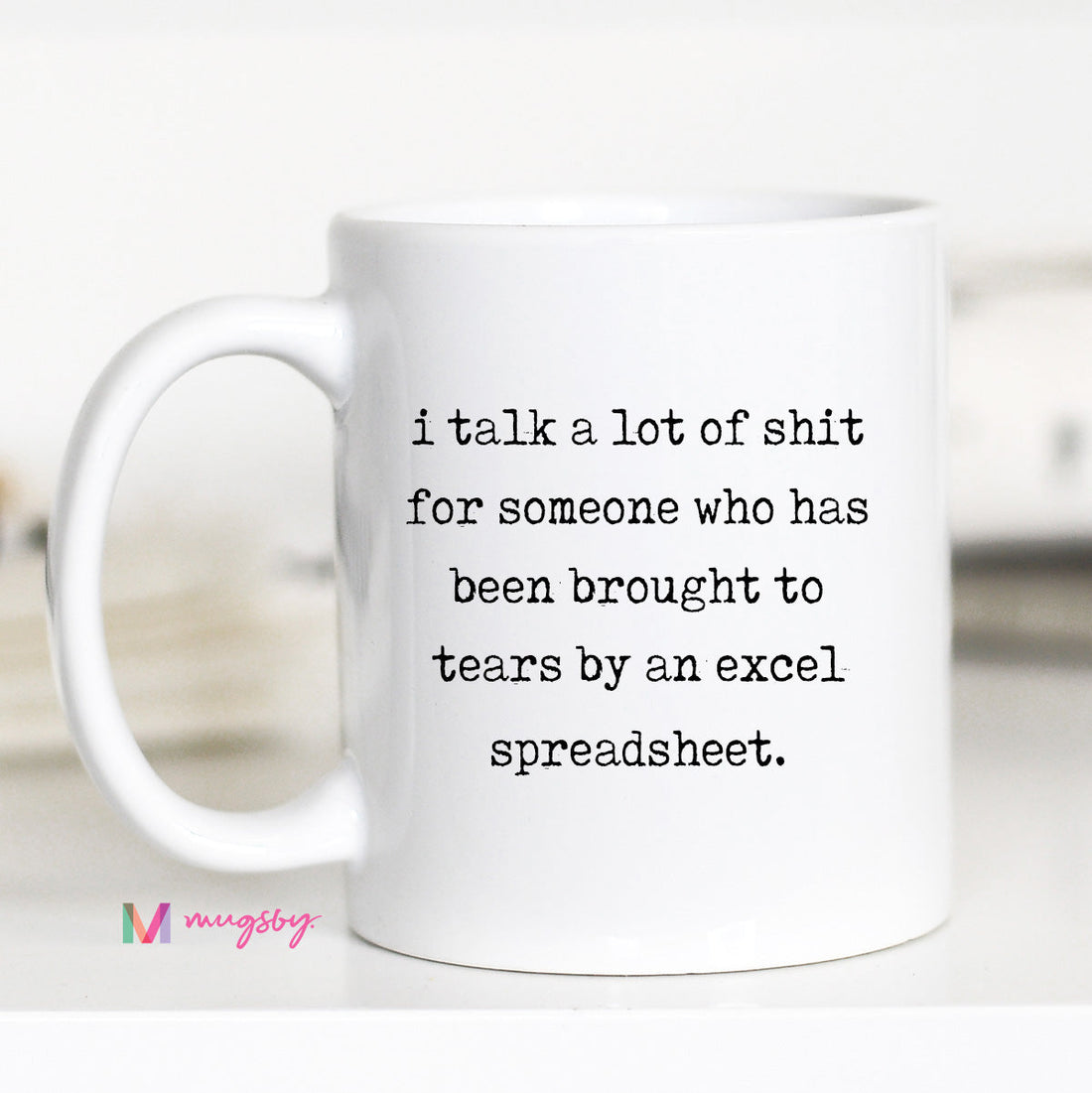 White mug with humorous text on a white background