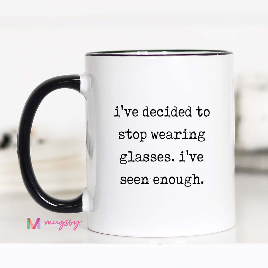 White mug with black text and black handle on a white background
