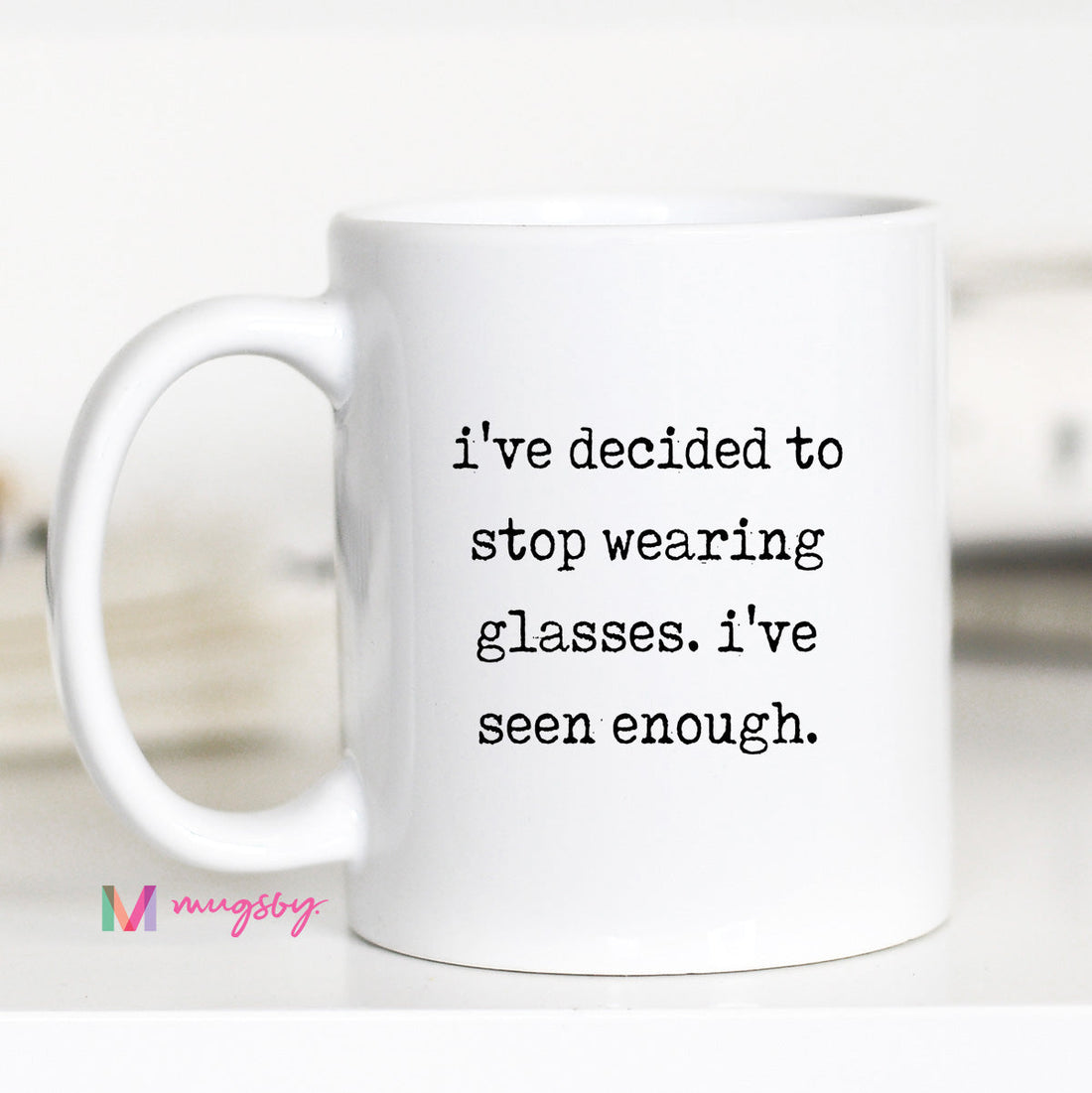 White mug with humorous text on a white background