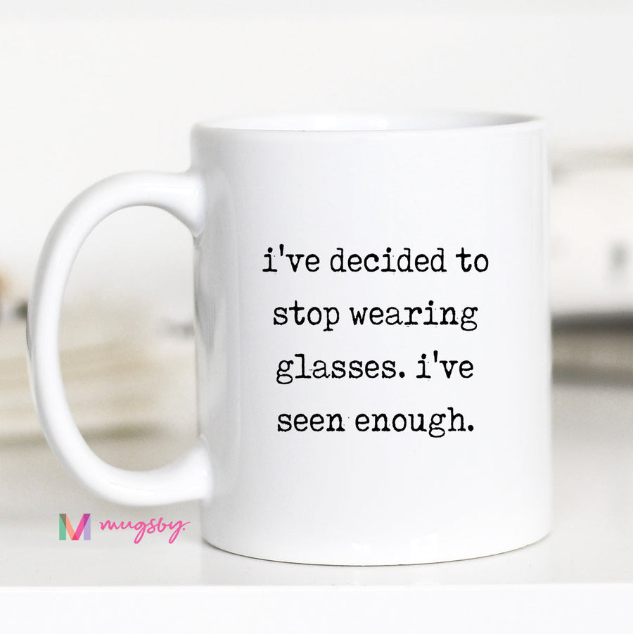 White mug with humorous text on a white background