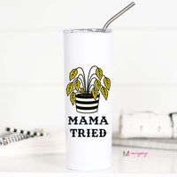 Tumbler with 'Mama Tried' design and plant illustration on a white background