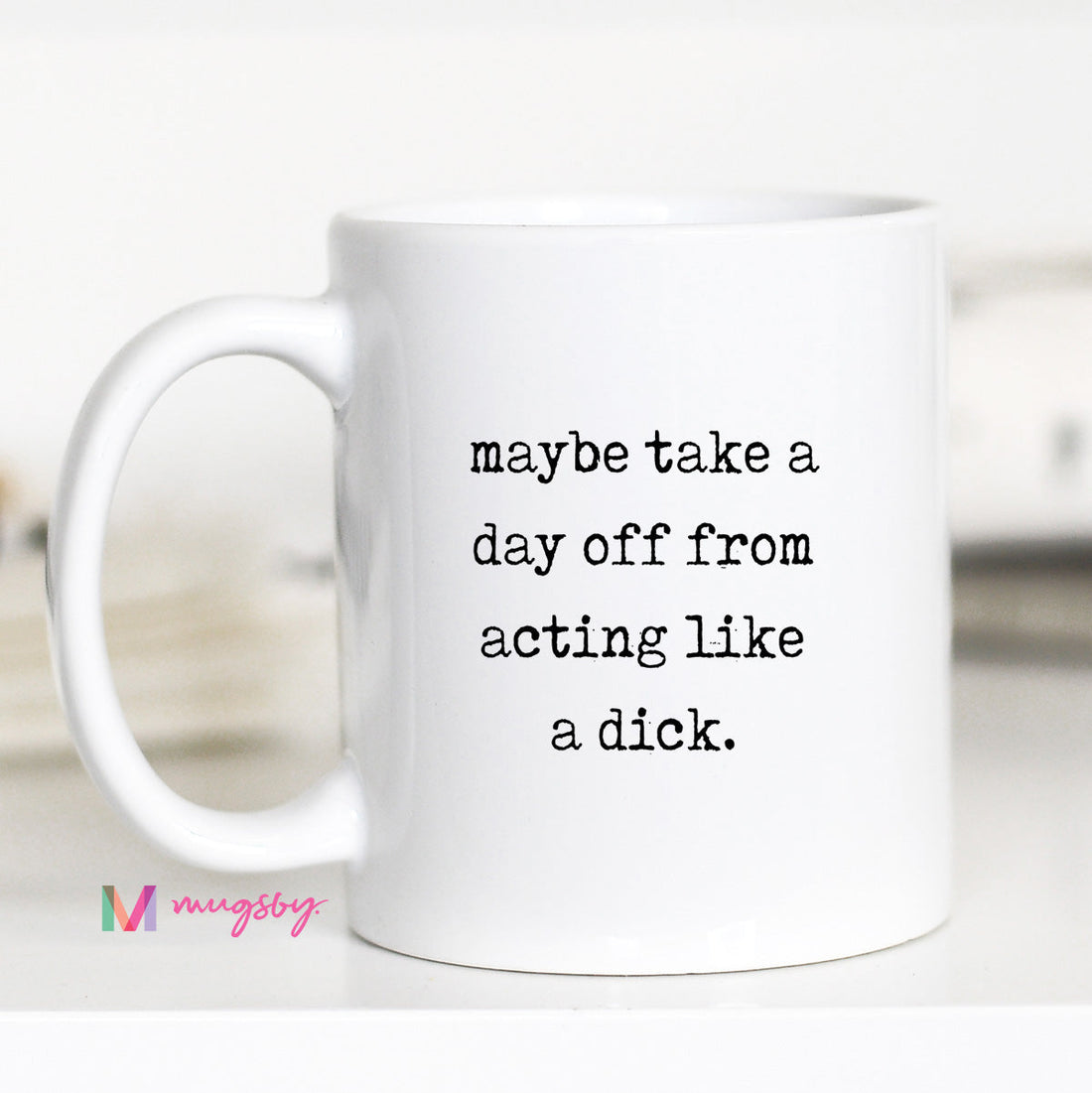 White mug with text &
