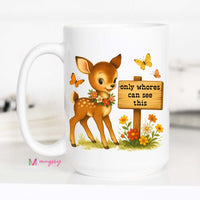 Mug with a cartoon deer and flowers design, featuring a sign with text.