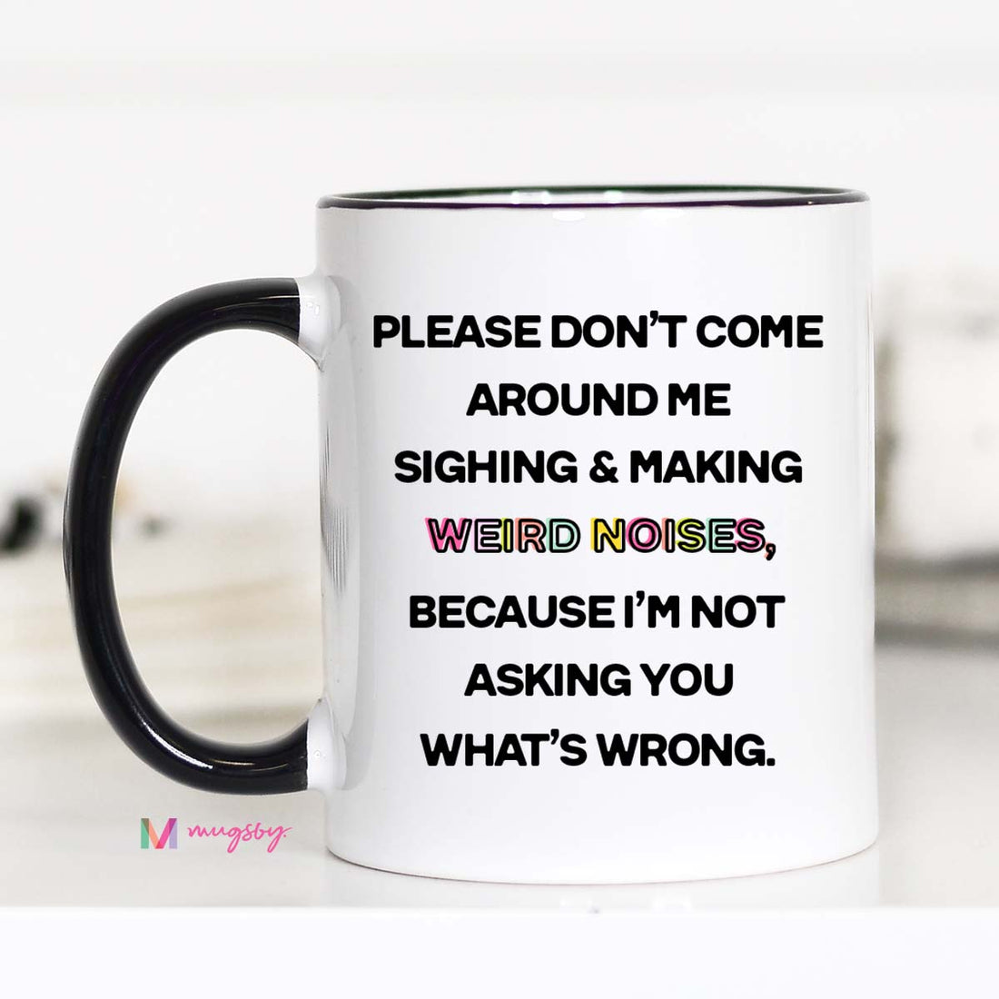 Ceramic coffee mug that says &