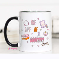 Mug with 'The Life of a Bookgirl' design featuring books, headphones, and other book-themed illustrations on a white background.