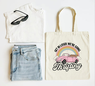 White tank top, blue jeans, sunglasses, and a tote bag with a car and rainbow design on a white background.