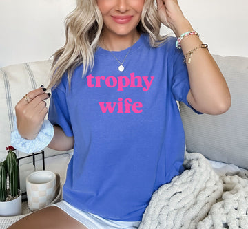 Trophy wife on electric blue tee with hot pink writing