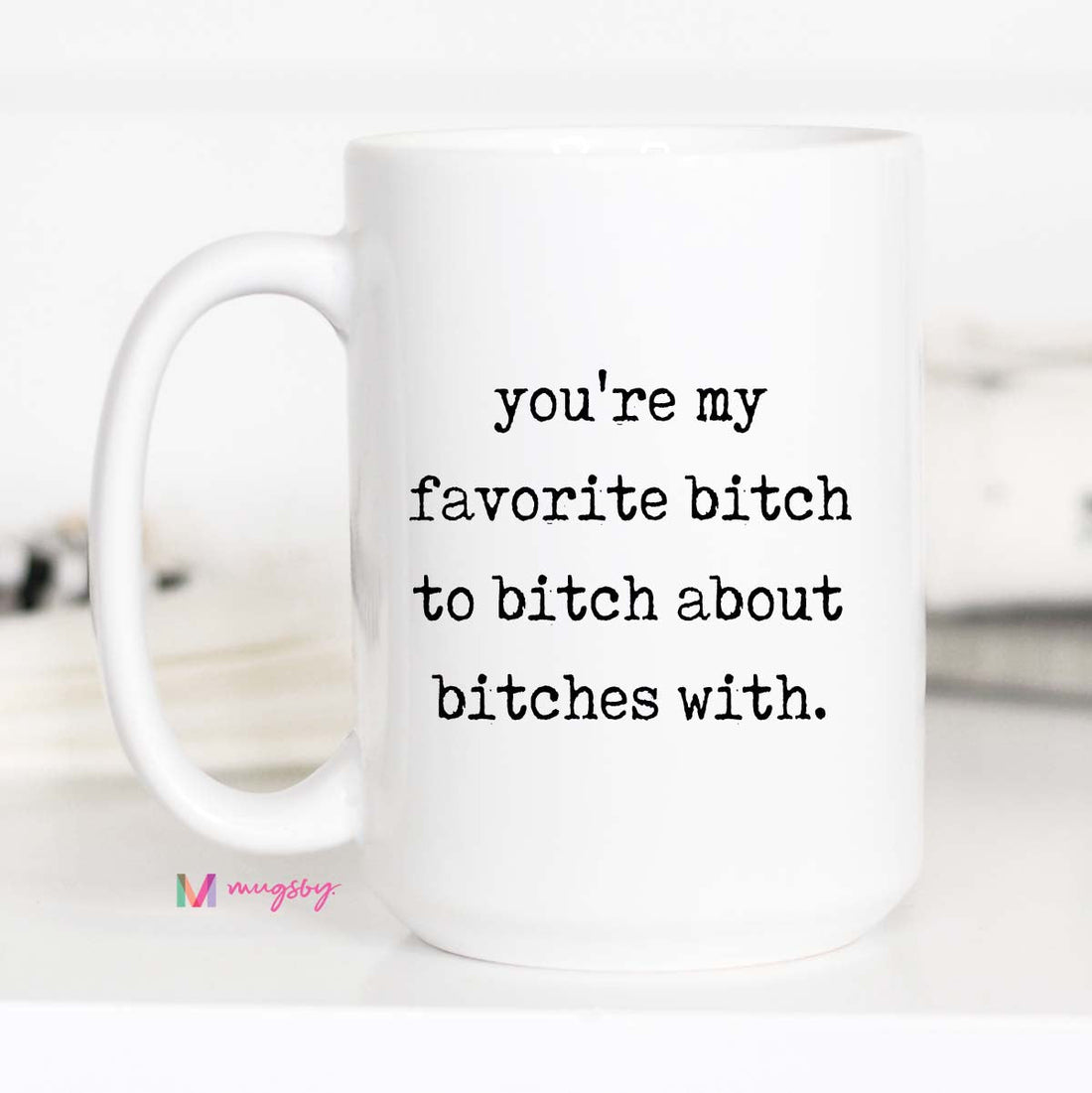 White mug with humorous text on a white background